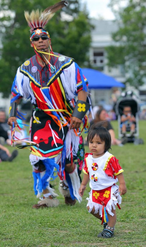 Brandon Sun Cole Scott dances with his father Gerald Scott during National Aboriginal Day celebrations, Thursday afternoon at New Era School in Brandon. (Colin Corneau/Brandon Sun)