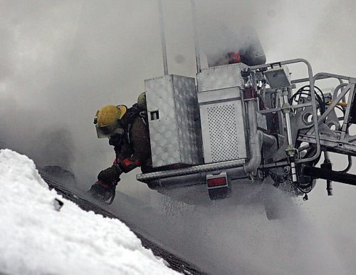 BORIS MINKEVICH / WINNIPEG FREE PRESS  070220 Scene of a fire at St. Ignatius School at 239 Harrow. The school's early years building had a fire in the roof attic. The whole school's population is 240.