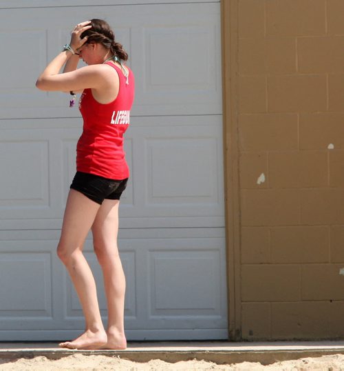 A Lifeguards shows emotion at Selkirk Park Pool in Selkirk, Manitoba after unconfirmed reports of a near drowning or drowning in the pool Monday June 25, 2012   (JOE BRYKSA / WINNIPEG FREE PRESS)