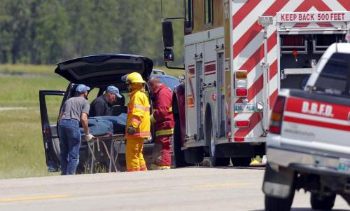 Fatal MVC. Truck vs. Semi. On 44 just east of Beausejour, MB. Here they load up the dead body into a van. June 25, 2012  BORIS MINKEVICH / WINNIPEG FREE PRESS