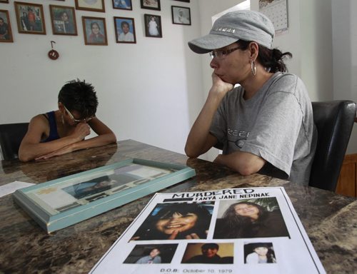 Gail Nepinak at right, she is the sister of Tanya Jane Nepinak and at left is Tanya's auntie Susan Caribou speak about the arrest of a serial killer.  Alex Paul story. (WAYNE GLOWACKI/WINNIPEG FREE PRESS) Winnipeg Free Press  June 25 2012