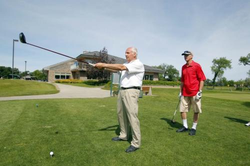 BLIND GOLF - DOUG SPEIRS COLUMN- Blind golf champion Victor Goetz at Tuxedo Golf Course. Here his is with Juergen Werner, right.  June 25, 2012  BORIS MINKEVICH / WINNIPEG FREE PRESS