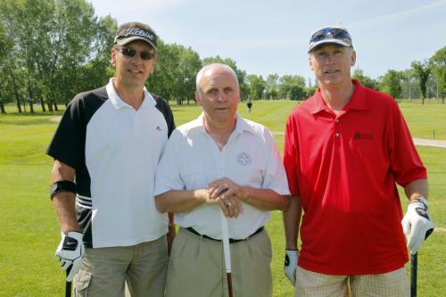 BLIND GOLF - DOUG SPEIRS COLUMN- Blind golf champion Victor Goetz at Tuxedo Golf Course. Here his is with his two golf helpers/coaches ]Don Dulder and Juergen Werner on each side of Victor.(L-R)  June 25, 2012  BORIS MINKEVICH / WINNIPEG FREE PRESS