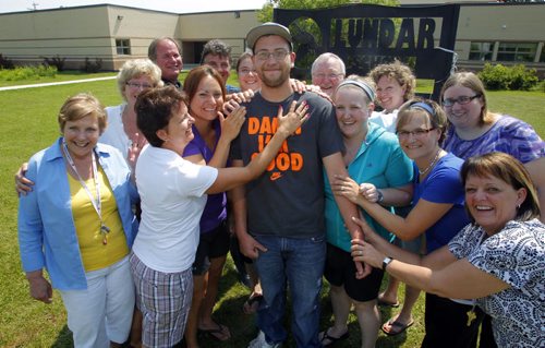 Neil Burnet of Lundar, MB graduated from Grade 12 last week having never misses a single day of school, from kindergarten to graduation. He was honoured with a special certificate. In this photo he poses with the teachers from the school.  June 26, 2012  BORIS MINKEVICH / WINNIPEG FREE PRESS