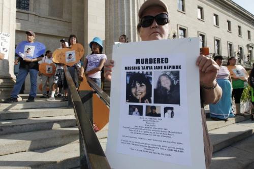 June 26, 2012 - 120626  -  Family and friends and supporters gather at a march and vigil for murdered and missing women in Canada at the Manitoba Legislature Tuesday, June 26, 2012.    John Woods / Winnipeg Free Press