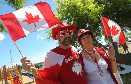 Brandon Sun Allan and Eliza Kingdon of Erickson, Man., displayed their patriotism with their red and white maple leafs during Sunday's Canada Day celebrations at the Riverbank Discovery Centre. (Bruce Bumstead/Brandon Sun)