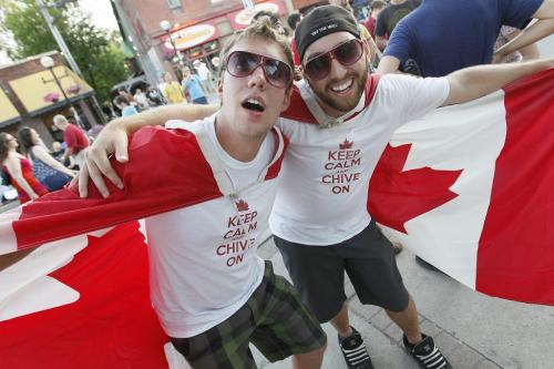 July 1, 2012 - 120701  -  Justin Holland and Scott Croghan celebrate Canada Day at Osborne Village Sunday, July 1, 2012.    John Woods / Winnipeg Free Press