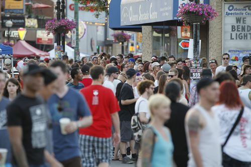 July 1, 2012 - 120701  -  People celebrate Canada Day at Osborne Village Sunday, July 1, 2012.    John Woods / Winnipeg Free Press