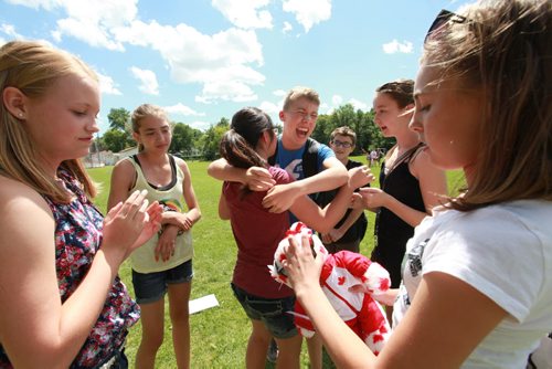 Windsor School Class of 2017 Grade seven students spend their last day of school going for ice cream to the BDI, signing year books and saying goodbye's to their grade seven classmates that are moving on to high school and Han an exchange student who is going home after spending a year with her classmates in Canada. See Doug Speirs story. Also see more photo's taken June 20.  June 29,  2012 (Ruth Bonneville/Winnipeg Free Press)