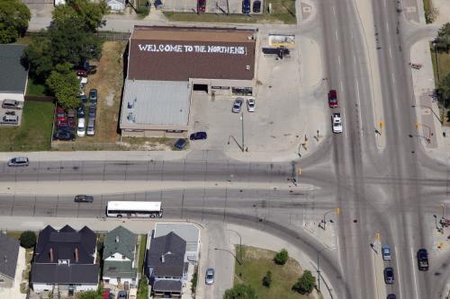 AERIAL PHOTOS OVER WINNIPEG- At the end of the Slaw Rebchuk on the north side is a business that says Welcome to the North End. July 3, 2012  BORIS MINKEVICH / WINNIPEG FREE PRESS
