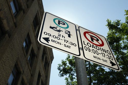 Parking in  high use areas , parking signs on Arthur St  Mary Agnes Welch story Äì Parking rates going up in the exchange  and other high use areas  KEN GIGLIOTTI  / WINNIPEG FREE PRESS  /  July 5 2012