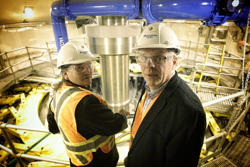 NCN Chief Jerry Primrose and Preimer Greg Selinger get a close look of the working turbine at Wuskwatim.  The  Wuskwatim Generating Station located on the Burntwood River in northern Manitoba where the first of three generators went online. The station will provide around 200-megawatt's for the province and marks the first time Manitoba Hydro has fully partnered with a local First Nation. 120705 July 5, 2012 Mike Deal / Winnipeg Free Press
deal2012poy
