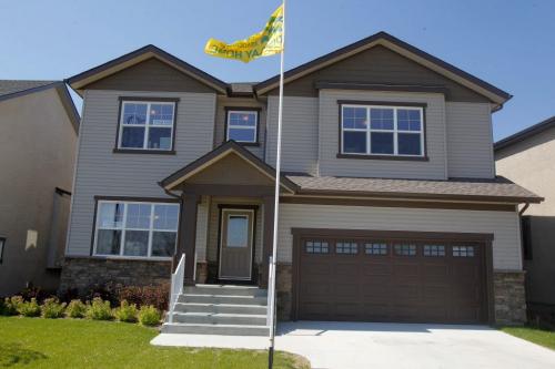 68 North Town Road in Waverley West. Todd Lewys story. July 5, 2012 BORIS MINKEVICH / WINNIPEG FREE PRESS