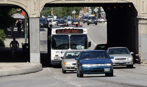Violence and abuse of Wpg City transit drivers on the upswing  - city bus on Main St. Wpg Transit operates  in Wpg toughest neighbourhoods  Jen Skerritt story - KEN GIGLIOTTI  / WINNIPEG FREE PRESS  /  July 6 2012