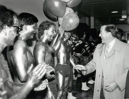 Mayor Bill Norrie laughs with a group of University of Manitoba students painted and dressed as the Golden Boy during a party at Eaton Place celebrating Winnipeg's 110th birthday. 1983 (GLENN OLSEN / WINNIPEG FREE PRESS) archives