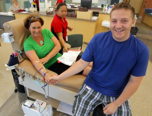 MB government's the honorable Theresa Oswald was recruited by Graeme Fortlage,R, to give blood. INTERN STORY. July 9, 2012  BORIS MINKEVICH / WINNIPEG FREE PRESS