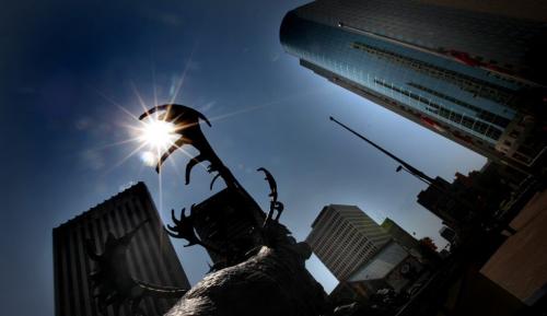 The sun forms a starry halo round a sculpted Caribou antler as Tuesday's temperature climbed the Caribou kept heading West down Portage from Main (+36C w/humidex)  See story. July 10, 2012 - (Phil Hossack / Winnipeg Free Press)