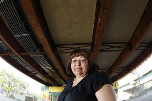 July 10, 2012 - 120710  -   Georgina Wood is photographed beside the new Disraeli Bridge Tuesday, July 10, 2012. Wood lives on Disraeli Street and has not received a response from the city authorities after lodging complaints regarding noise and vibrations from the construction. John Woods / Winnipeg Free Press