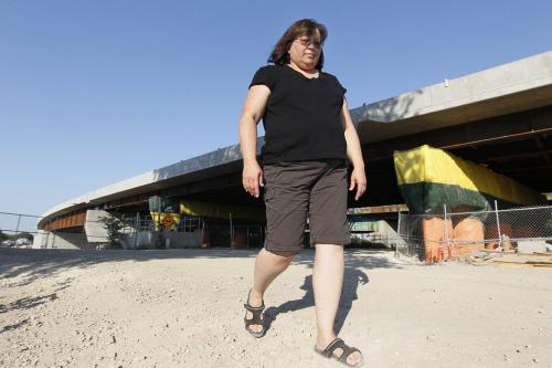 July 10, 2012 - 120710  -   Georgina Wood is photographed beside the new Disraeli Bridge Tuesday, July 10, 2012. Wood lives on Disraeli Street and has not received a response from the city authorities after lodging complaints regarding noise and vibrations from the construction. John Woods / Winnipeg Free Press