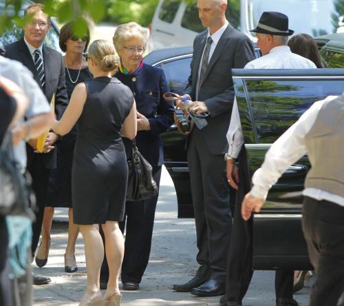 Bill Norrie funeral. Crescent Fort Rouge United Church. Bill Norrie family arrives. Helen Norrie in blue suit. Woman next to tall guy is Helen his wife. July 11, 2012  BORIS MINKEVICH / WINNIPEG FREE PRESS
