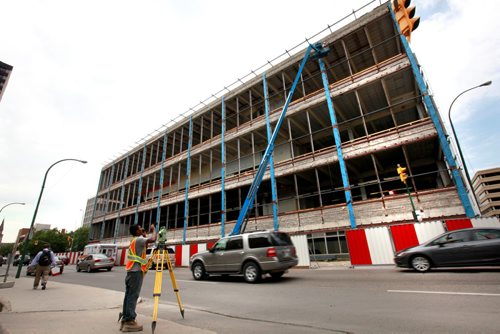 The old post office on Graham Ave. is under construction with the south facing walls on St. Mary wide open.  July 11 2012. Ruth Bonneville/Winnipeg Free Press Winnipeg Police Headquarters PSB building