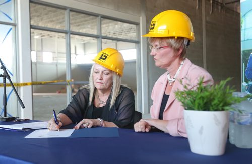 Brandon Sun Brandon University's president Debora Poff and Mayor Shari Decter Hirst signed an agreement for public use of new Healthy Living Centre on the Brandon University Campus on Wednesday afternoon. (Bruce Bumstead/Brandon Sun)