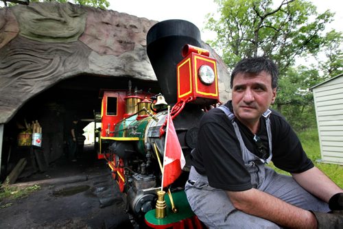 The owner and operator of the  Minature Steam Train at the Assiniboine Park - Tim Buzunis has seen a 55% drop in business that he says is due to the closure of the east zoo gate.  See Katherine Dow's story. July 12 2012, Ruth Bonneville Winnipeg Free Press