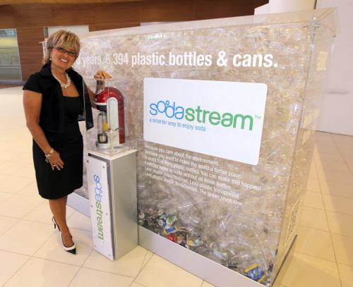SodaStream - Marta Mikita-Wilson poses for a photo at her display at the James Richardson International Airport. Her product bakes bubbly water. July 11, 2012  BORIS MINKEVICH / WINNIPEG FREE PRESS