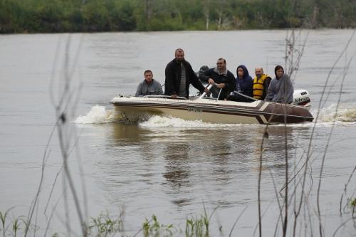 July 15, 2012 - 120715  - RCMP and residents of many Hutterite colonies search for eleven year old Becky Waldner in the Assiniboine River Winnipeg Sunday, July 15, 2012. On July 14, 2012 at about 8:00 p.m, Portage la Prairie RCMP and local emergency services were dispatched to search for the missing swimmer in the Assiniboine River near Poplar Point. John Woods / Winnipeg Free Press