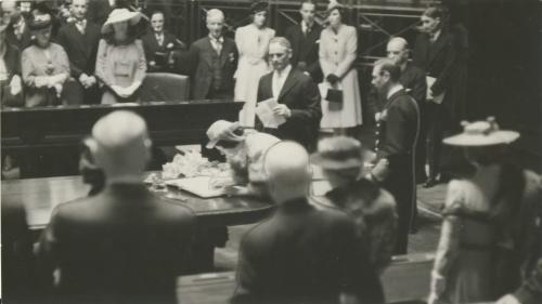 Winnipeg Free Press Archives King George VI and Queen Elizabeth in the Manitoba Legislative Chamber. High Moments in Royal Visit for Winnipeggers Queen signs visitor`s book at Legislature Building. fparchive May 25 1939.