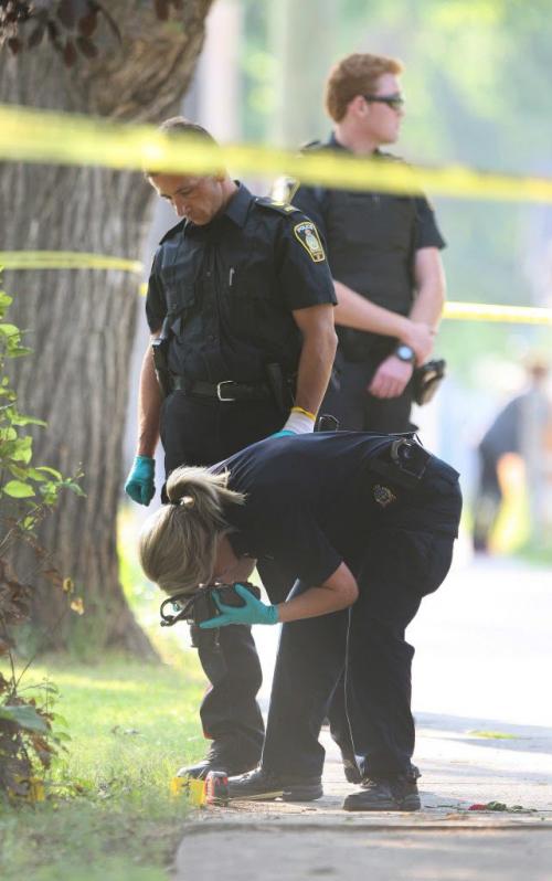 Winnipeg Police investigate early morning shooting in the 400 block of Burrows Ave Tuesday morning- See Alex Paul story June 17, 2012   (JOE BRYKSA / WINNIPEG FREE PRESS)