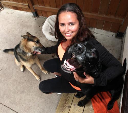 Yvonne Russell is launching an animal cruelty hotline. See here at home with her pooches Mike (left) and Garry. Paw Tipsters 
See Jennifer Ford's story. July 18, 2012 - (Phil Hossack / Winnipeg Free Press)