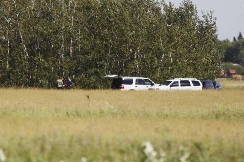 July 22, 2012 - 120722  -  RCMP remove a body from a wooded area just north of Selkirk and off of highway 4 Sunday, July 22, 2012.  John Woods / Winnipeg Free Press