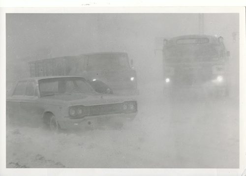 Jack Ablett/Winnipeg Free Press Archives Winnipeg Blizzard (20) March 4, 1966  Traffic on Portage Avenue at Polo Park at 8:30 a.m. Friday was barely visible. fparchive