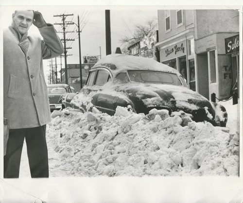 Bill Rose/Winnipeg Free Press Archives Winnipeg Blizzard (29) 1966 (undated) Motorist's car plowed under on Osborne Street fparchive