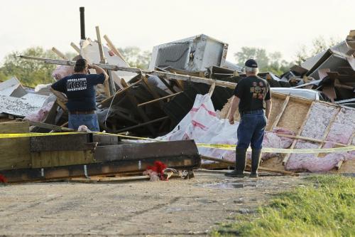 July 29, 2012 - 120729  -  Woodlands firefighters inspect a scene after strong winds and possibly a tornado lifted this home off of it's foundation and turned it upside down on Lake Francis Road just south of Twin Beach Road and south of St. Laurent, Manitoba Sunday July 29, 2012.    John Woods / Winnipeg Free Press