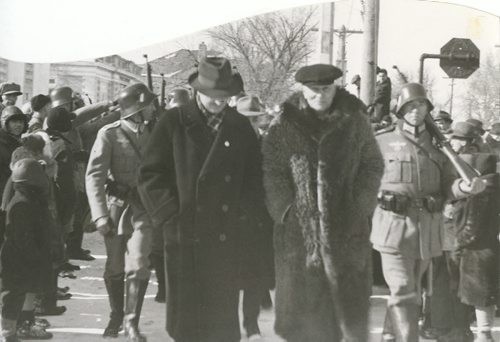 Winnipeg Free Press Archives World War II - If Day (1) February 19, 1944 Nazi Storm Troopers Demonstrate Invasion Tactics Under guard of Nazi troopers, Selkirk citizens are marched off to jail. fparchive