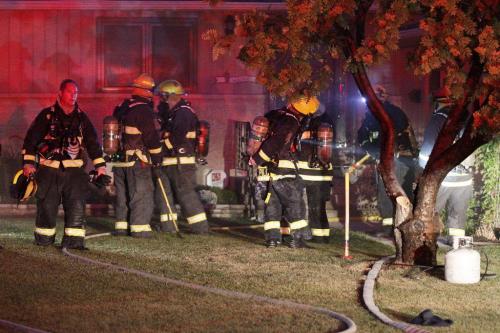 August 1, 2012 - 120801  -  Firefighters fight a fire at 70 Cameo Crescent Wednesday August 1, 2012. John Woods / Winnipeg Free Press