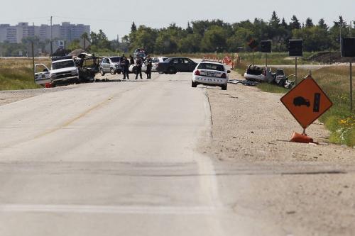 August 5, 2012 - 120805  -  RCMP attend to a MVA on Sturgeon just north of Inkster Sunday August 5, 2012.    John Woods / Winnipeg Free Press