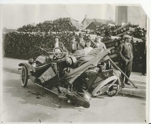 L.B. FOOTE/Winnipeg Free Press Archives Winnipeg storm  (4) June 17, 1919 Winnipeg scenes following wind storm  SECTION OF ROOF BLOWN ONTO CAR This is the automobile in which ex-Chief MacPherson and Mr. and Mrs. McKenzie were riding when the   car and occupants were struck by a large section of apartment block roofing blown from King to Main street. fparchive