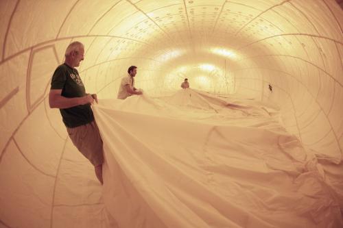 August 14, 2012 - 120811  -  Barry Prentice, Glenn Jensen, and Dale George unfolding the inside of an inflated airship envelope in Winnipeg Tuesday August 14, 2012.  Prentice plans to use the airship to transport goods to northern communities. John Woods / Winnipeg Free Press