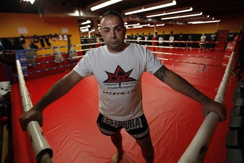 August 14, 2012 - 120811  -  Giuseppe DeNatale, mixed martial art trainer, poses for a photo in his gym in Winnipeg Tuesday August 14, 2012.   DeNatale says his name was used in the book Fifty Shades Darker. John Woods / Winnipeg Free Press