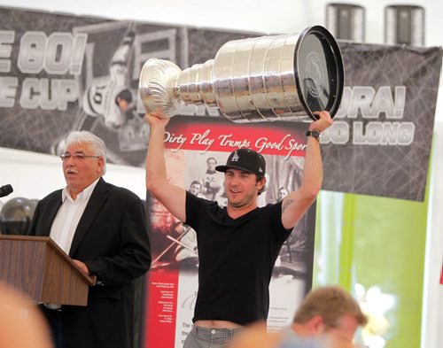 Kenora cheers on L.A. Kings' Mike Richards where he brough the Stanley cup home today. Thousands of fans gathered at the Harbourfront to see the Stanley Cup. August 18, 2012  BORIS MINKEVICH / WINNIPEG FREE PRESS