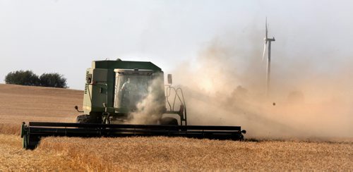 A farm couple near Altamont share the cab of a combine harvesting a field of wheat Monday afternoon......See Martin Cash story. August 20, 2012- (Phil Hossack / Winnipeg Free Press)