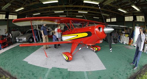 Acrosport II bi-plane at the Lyncrest Airfield, as part of the Western Canada Aviation Museum's Flyin' BBQ, Saturday, June 16, 2012. (TREVOR HAGAN/WINNIPEG FREE PRESS) - PLANED OWNED BY Gilbert Bourrier, far right in photo.