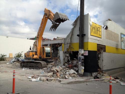 Crews demolish the old Movie Village building on Osborne. August 27, 2012  BORIS MINKEVICH / WINNIPEG FREE PRESS