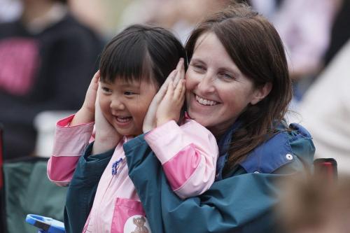 September 1, 2012 - 120901  -  Dayna Cherney and her  godmother Tracy Simcoe play around while watching performers from Manitoba Great Wall Performing Arts perform during a China cultural day at the Lyric Theatre in Assiniboine Park Saturday September 1, 2012.    John Woods / Winnipeg Free Press