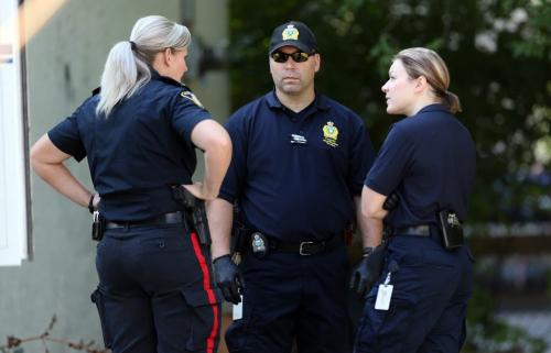Members of the Winnipeg Police Service Identification Unit on the scene at Burrows and Main, where police have confirmed that they have found a body, Monday, September 3, 2012. (TREVOR HAGAN/WINNIPEG FREE PRESS)