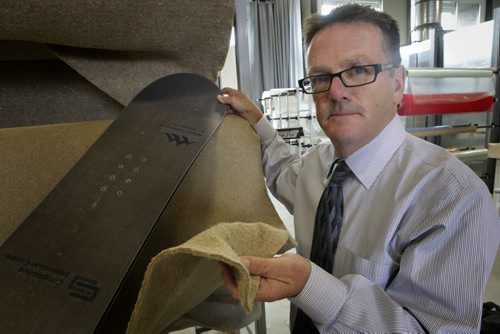 Sean McKay, Executive Director of Composites Innovation Centre, with some of the bio-fibre mat that is made from flax, hemp, wheat and resin that manufaturers can use to make products like snowboards, fenders, etc. See Martin Cash story year2}0906 - Thursday, September 06, 2012 -  (MIKE DEAL / WINNIPEG FREE PRESS)