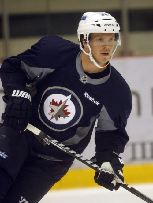 Winnipeg Jets are on the ice in an informal on ice session  at the MTS IcePlex  from 9-10:30 in pic D # Tobis Enstrom -  Ed Tait and Tim Campbell  KEN GIGLIOTTI  / WINNIPEG FREE PRESS  /  Sept. 11 2012